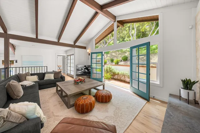 a outdoor living space with furniture and a potted plant