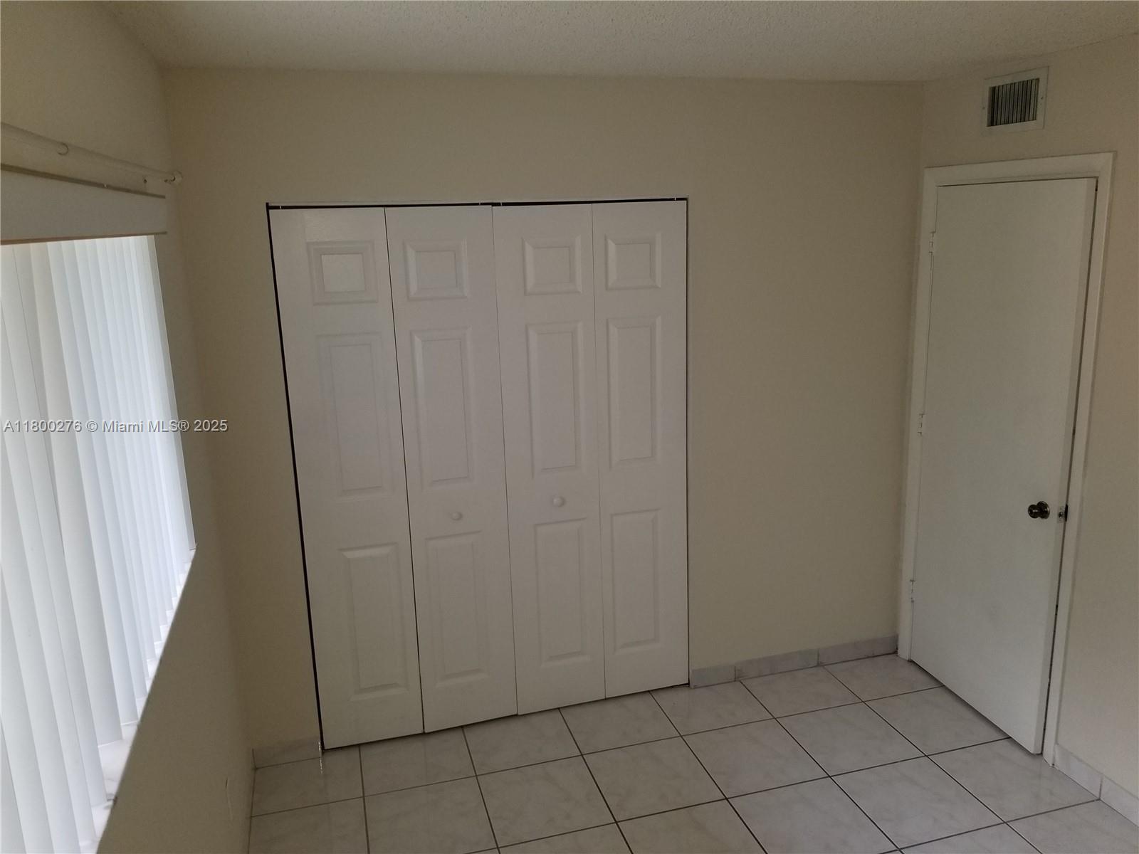8560 Sherman Circle North, Unit 402 Miramar, FL 33025 - Photo 15 of 19 a view of room with window