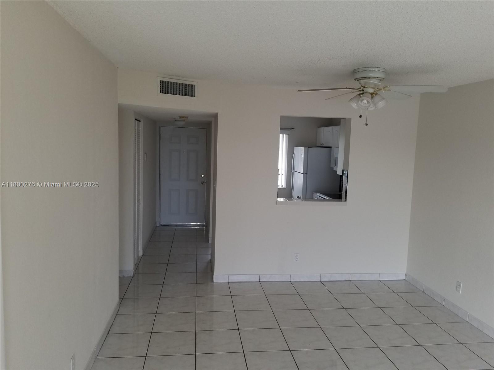 8560 Sherman Circle North, Unit 402 Miramar, FL 33025 - Photo 7 of 19 a view of a hallway
