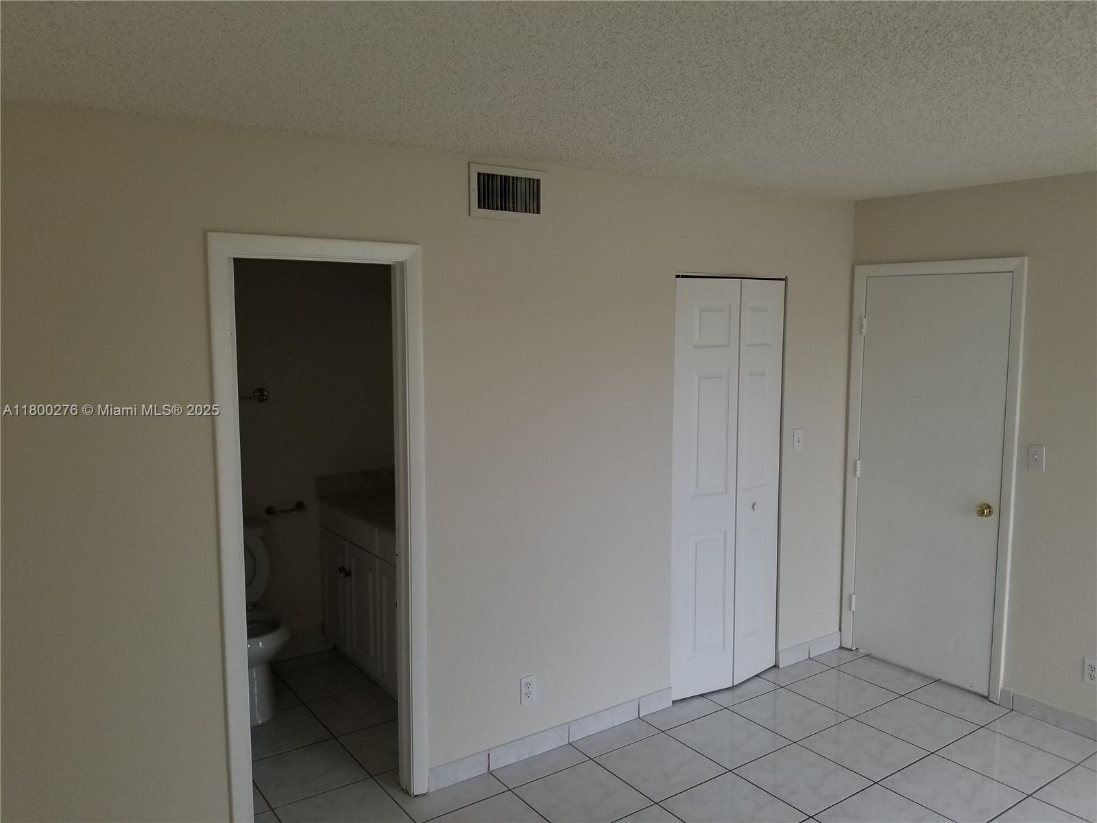8560 Sherman Circle North, Unit 402 Miramar, FL 33025 - Photo 9 of 19 a view of an empty room