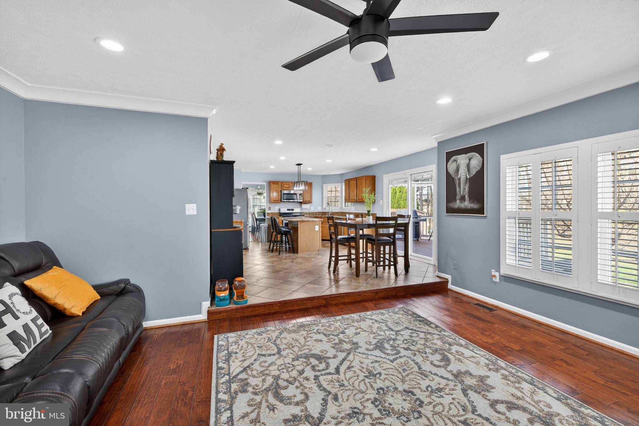 611 Hunting Ridge Drive Frederick, MD 21703 - Photo 20 of 50 a living room with furniture and a wooden floor