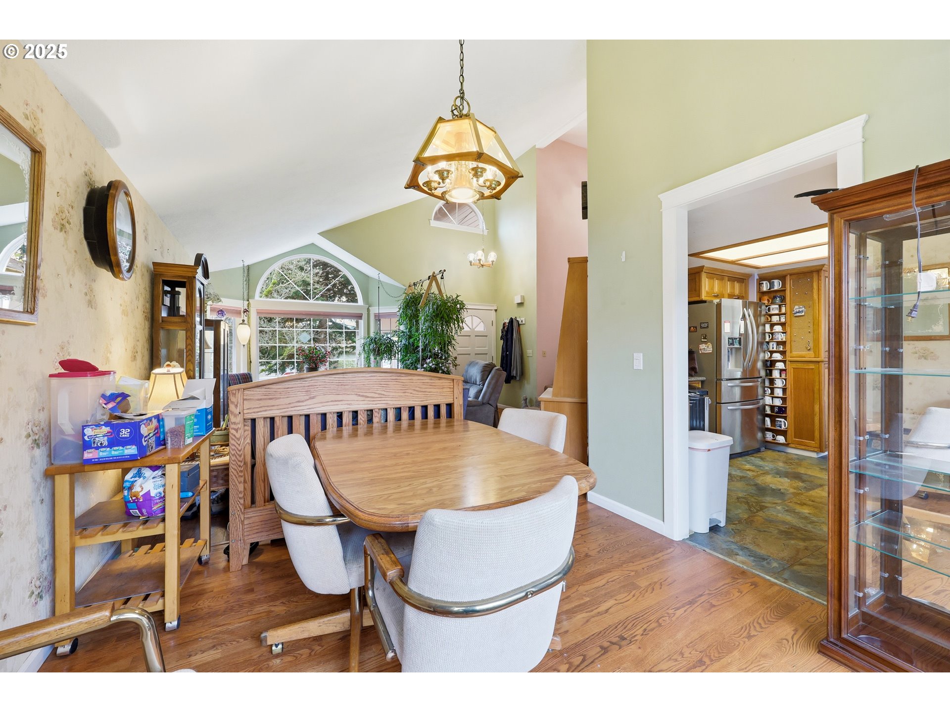 3749 Southwest 6th Street Gresham, OR 97030 - Photo 13 of 41 a view of a dining room with furniture and chandelier