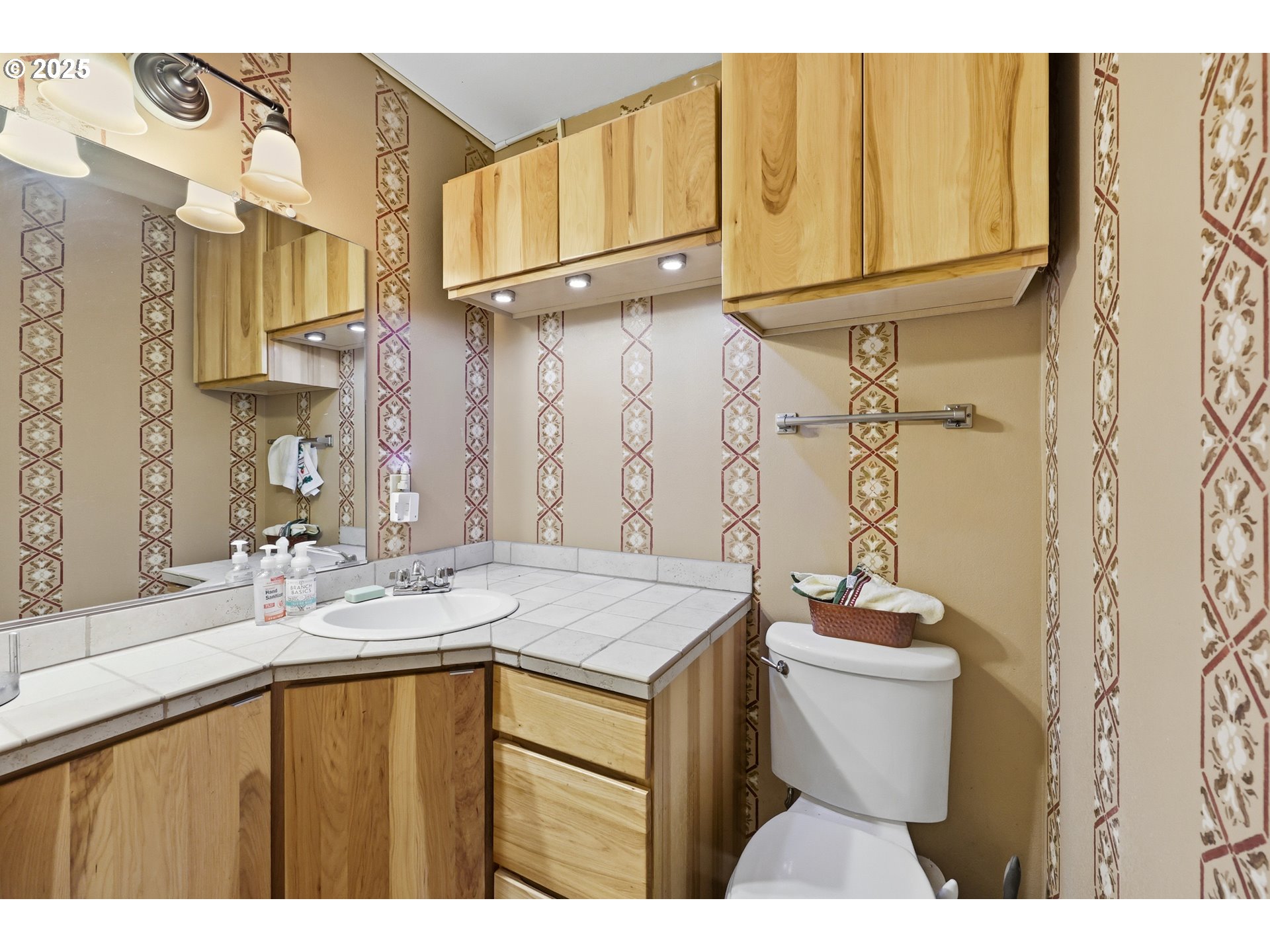 3749 Southwest 6th Street Gresham, OR 97030 - Photo 21 of 41 a bathroom with a sink and a mirror