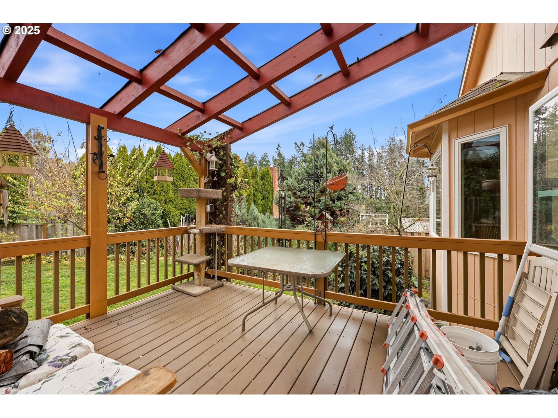 3749 Southwest 6th Street Gresham, OR 97030 - Photo 34 of 41 a view of balcony with wooden floor and outdoor seating