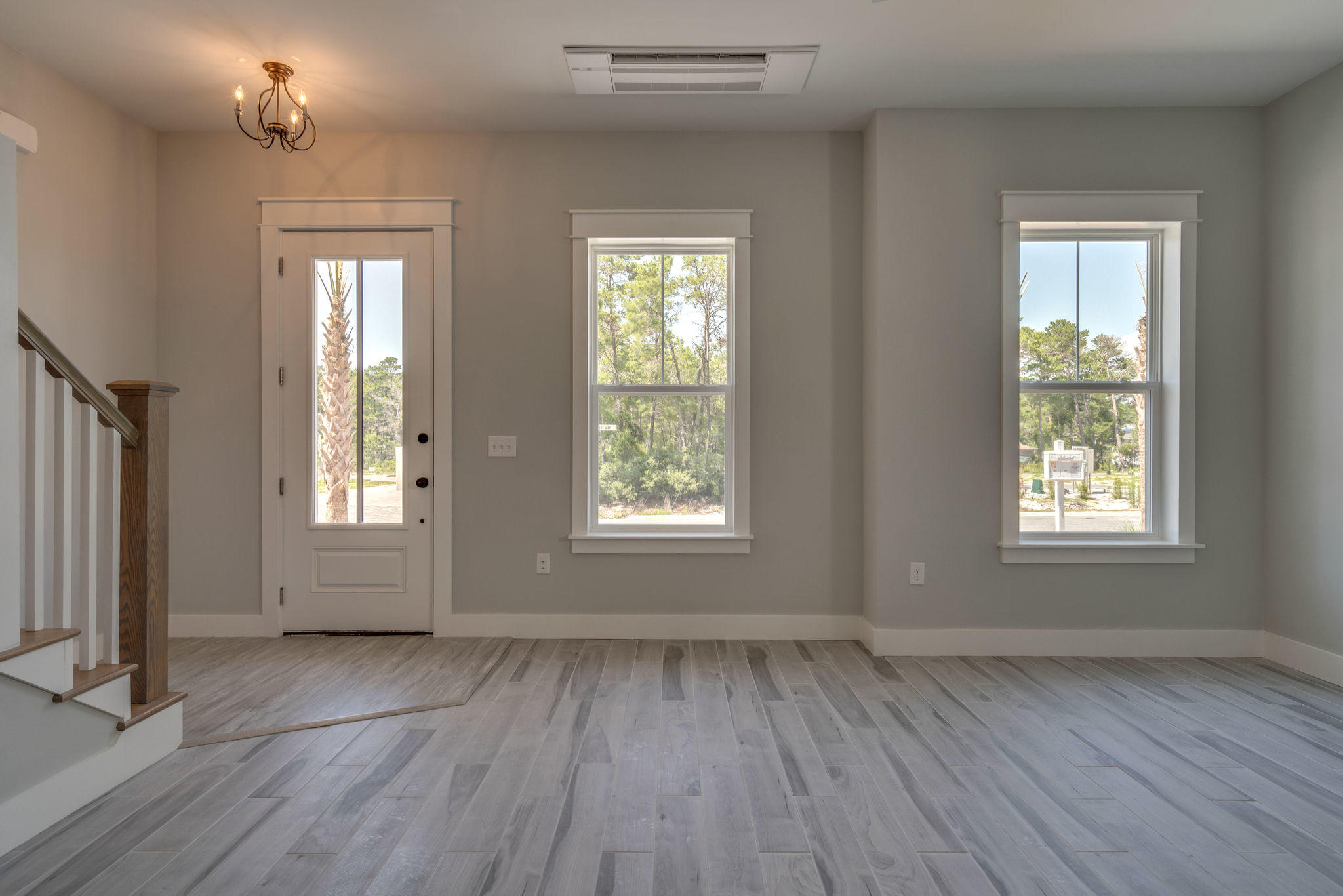Lot 4 Valdare Way Inlet Beach Inlet Beach, FL 32461 - Photo 6 of 52 an empty room with wooden floor and windows