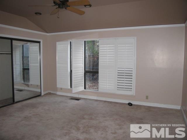 682 West Riverview Circle Reno, NV 89509 - Photo 5 of 11 an empty room with a empty space and windows