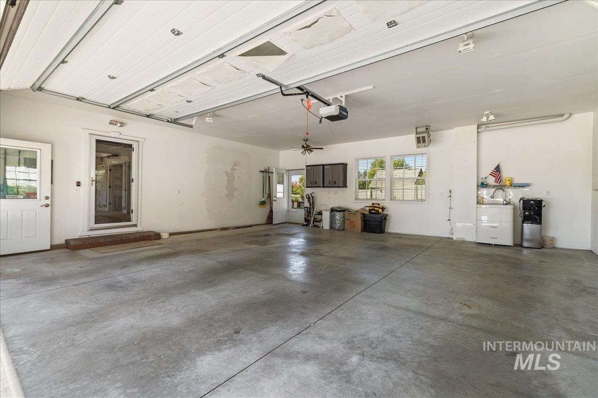5611 West Hill Road Boise, ID 83703 - Photo 31 of 48 Garage with a garage door opener