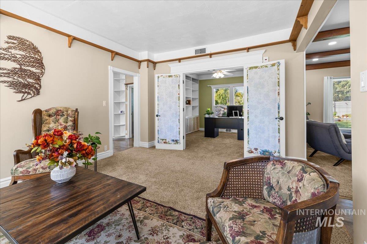 5611 West Hill Road Boise, ID 83703 - Photo 8 of 48 Carpeted living area facing the office.