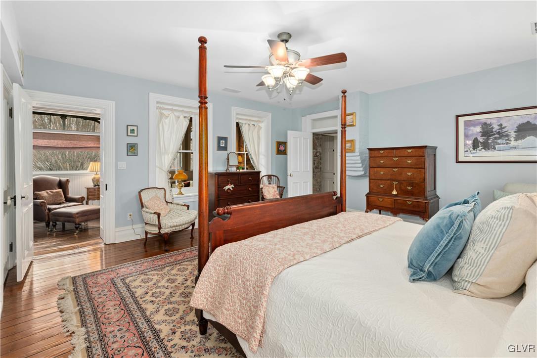 2332 Kunsman Road Quakertown, PA 18951 - Photo 20 of 53 a bedroom with a large bed and wooden floor