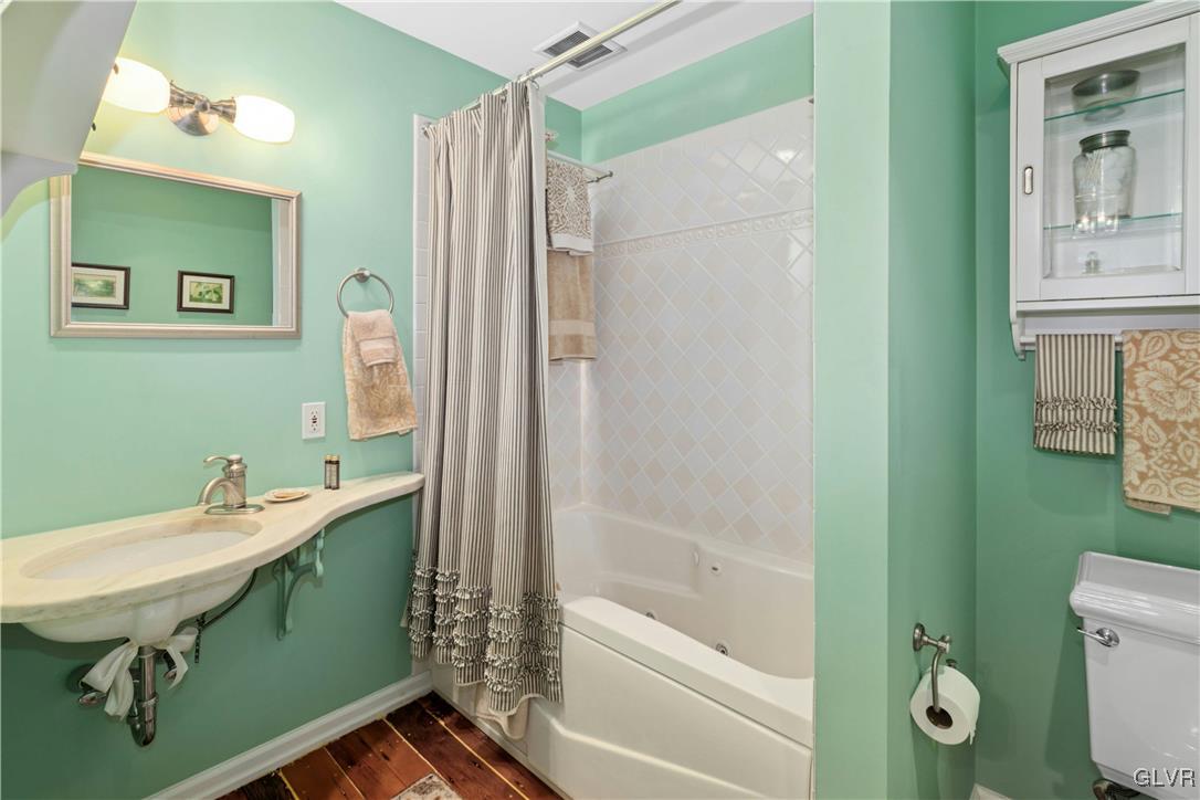 2332 Kunsman Road Quakertown, PA 18951 - Photo 26 of 53 a bathroom with a tub sink and mirror