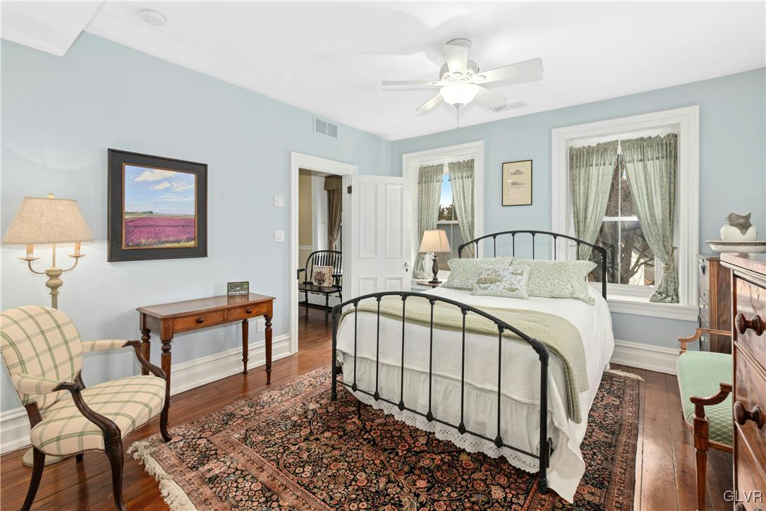 2332 Kunsman Road Quakertown, PA 18951 - Photo 27 of 53 a bedroom with a bed and a chandelier