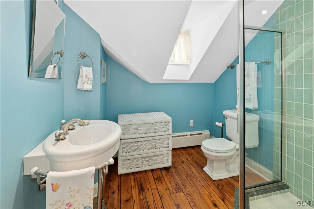 2332 Kunsman Road Quakertown, PA 18951 - Photo 32 of 53 a bathroom with a sink toilet a mirror and shower