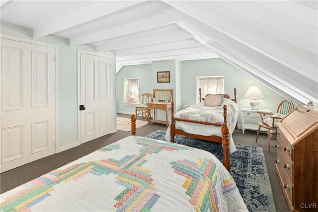 a view of a patio with table and chairs potted plants