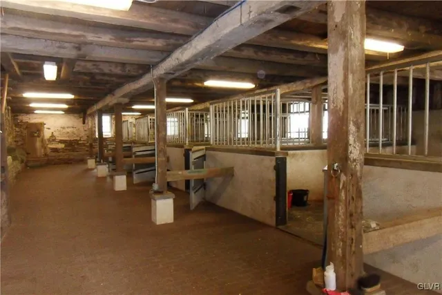 a front view of house with yard and trees
