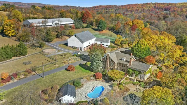 an aerial view of residential house with outdoor space
