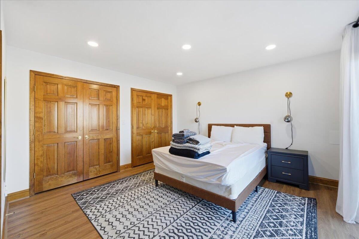 1970 Morewood Road Hardy, VA 24101 - Photo 40 of 61 a bedroom with a bed and wooden floor