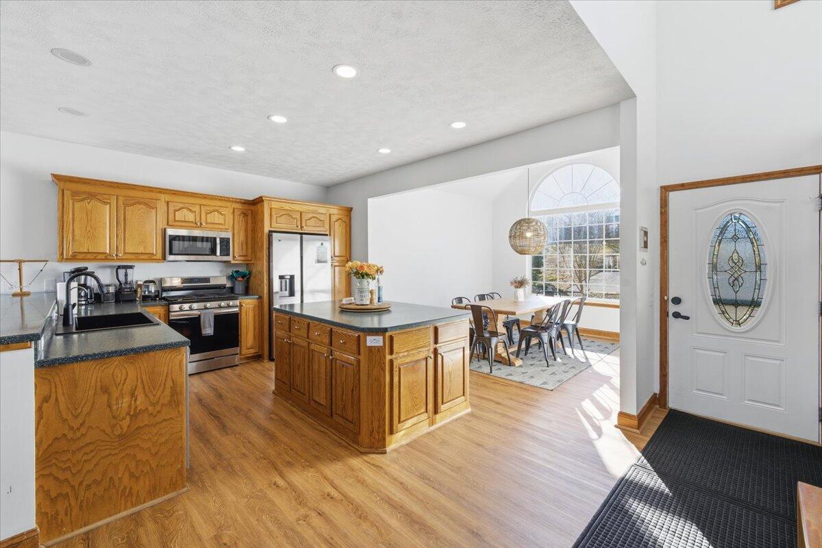 1970 Morewood Road Hardy, VA 24101 - Photo 5 of 61 a living room with furniture a wooden floor and next to a window