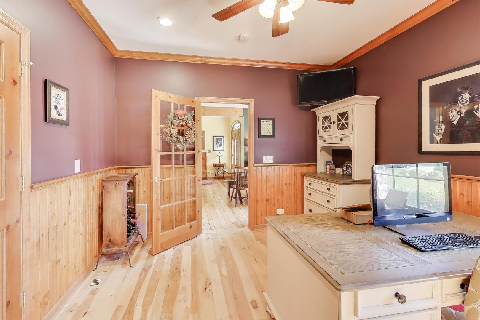 9206 Pine Needle Pass Bull Valley, IL 60097 - Photo 12 of 44 a living room with stainless steel appliances kitchen island granite countertop furniture and a view of living room