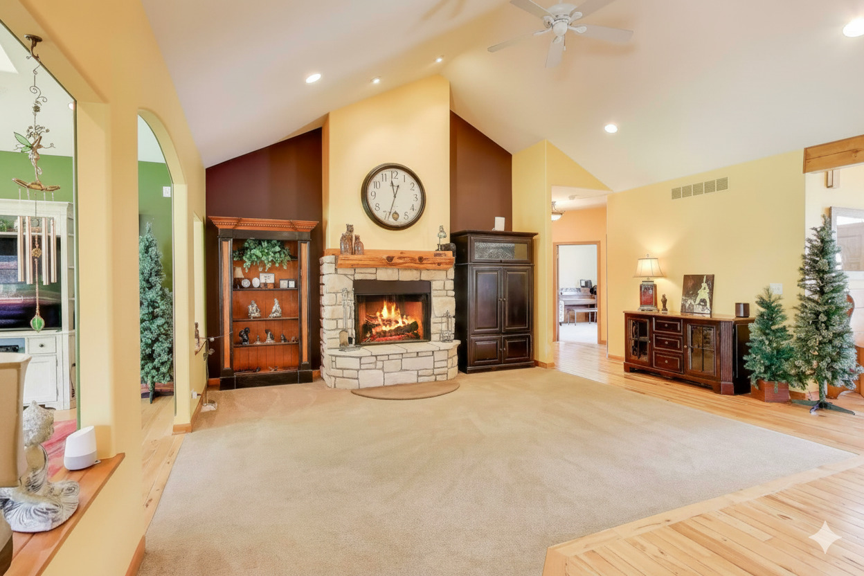 9206 Pine Needle Pass Bull Valley, IL 60097 - Photo 4 of 44 a view of an empty room with a fireplace and a window