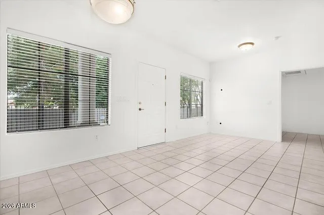 a view of an empty room and window