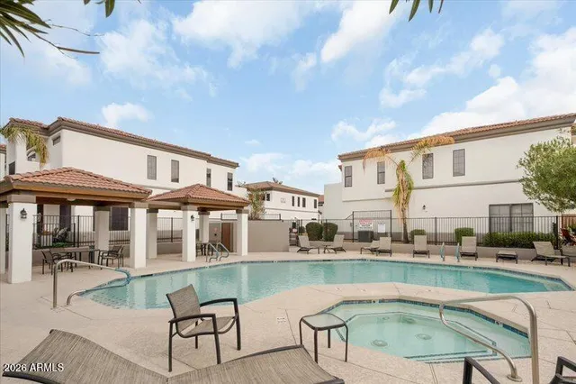 a swimming pool with outdoor view