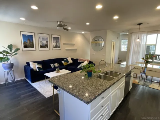 a kitchen with a table and chairs