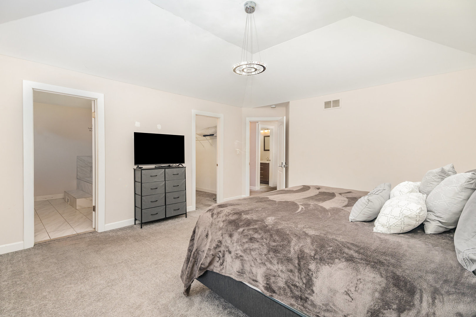 16314 Homan Avenue Markham, IL 60428 - Photo 18 of 32 a bedroom with a bed and a flat screen tv