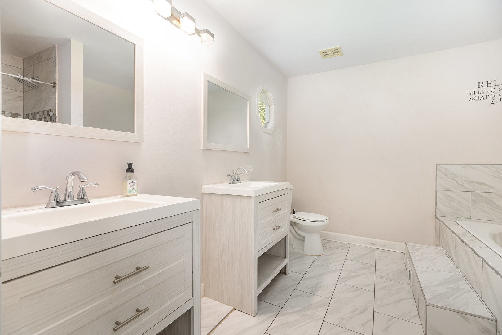 16314 Homan Avenue Markham, IL 60428 - Photo 20 of 32 a bathroom with a toilet sink and mirror