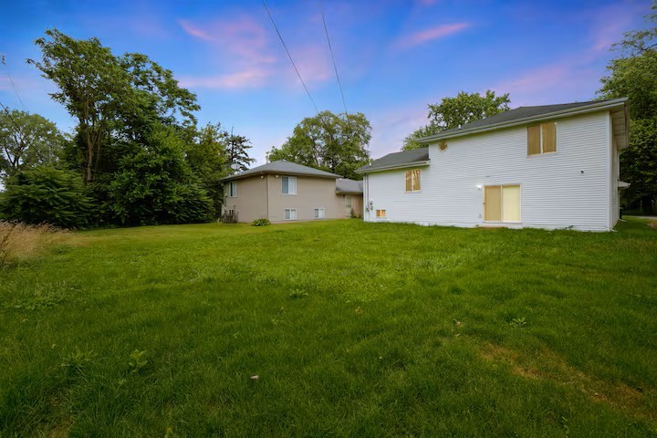 16314 Homan Avenue Markham, IL 60428 - Photo 30 of 32 a view of a house with a yard