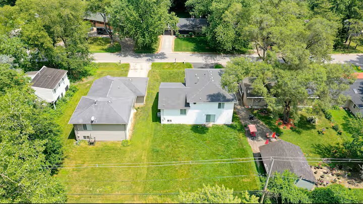 16314 Homan Avenue Markham, IL 60428 - Photo 31 of 32 an aerial view of a house with outdoor space pool seating area and yard