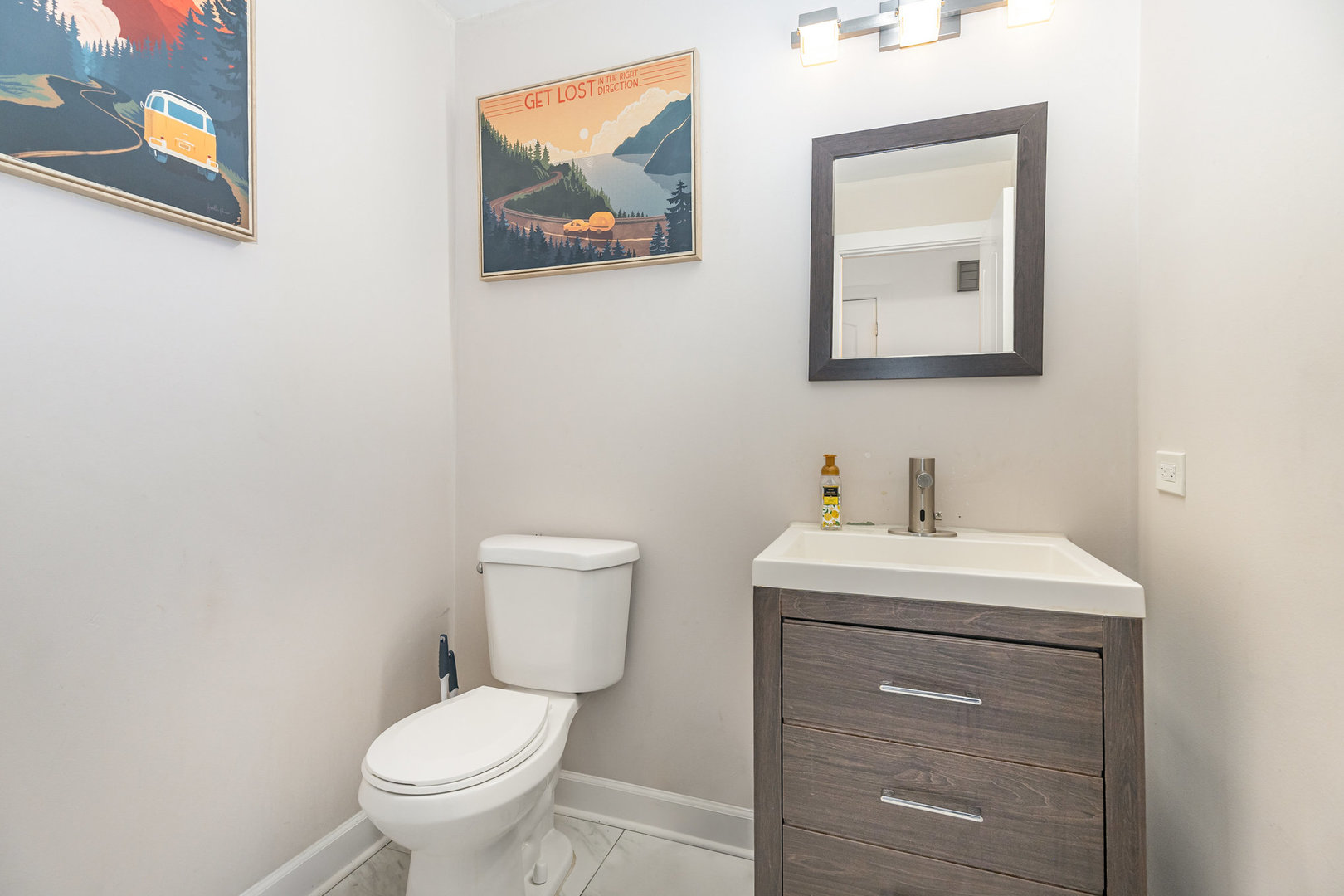 16314 Homan Avenue Markham, IL 60428 - Photo 7 of 32 a bathroom with a toilet sink and mirror