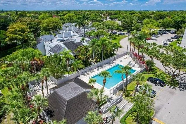 an aerial view of a house with a garden