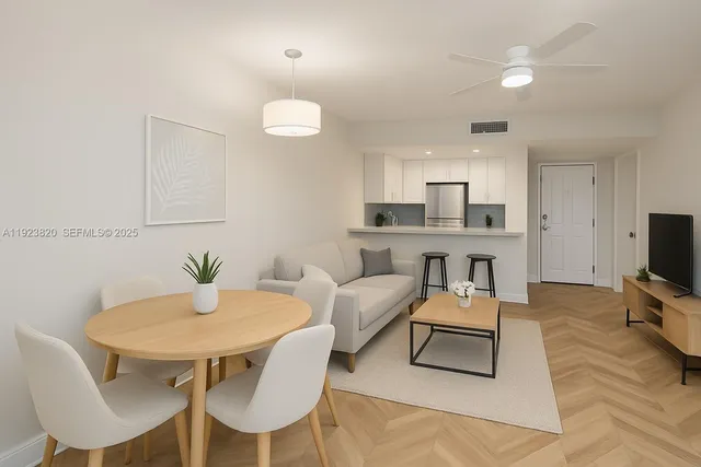 a view of a dining room with furniture