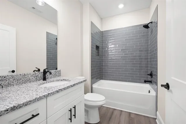 a view of entryway with wooden floor