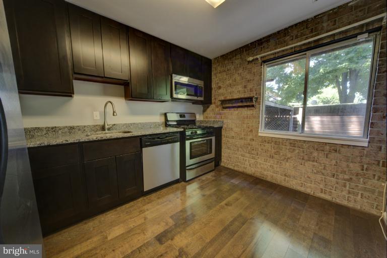 19317 Club House Road, Unit 103 Montgomery Village, MD 20886 - Photo 14 of 17 Kitchen