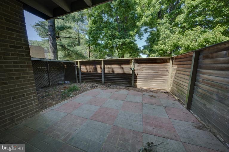 19317 Club House Road, Unit 103 Montgomery Village, MD 20886 - Photo 9 of 17 Rear patio and Garden