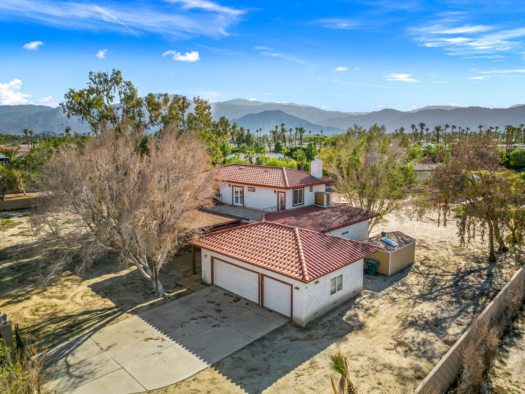 48755 Southview Place Indio, CA 92201 - Photo 11 of 55 a view of a terrace with a water view and mountain view