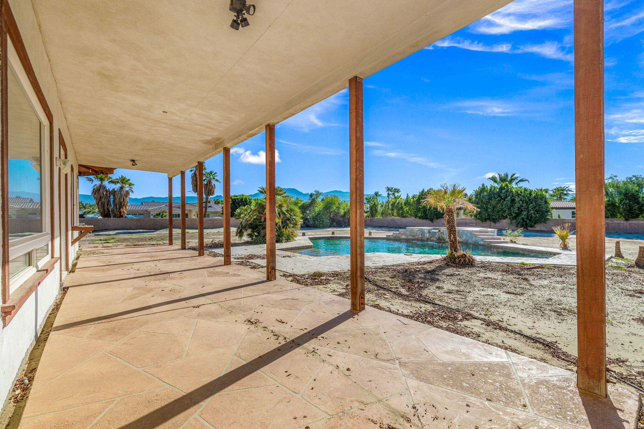 48755 Southview Place Indio, CA 92201 - Photo 14 of 55 a view of a pathway with a building