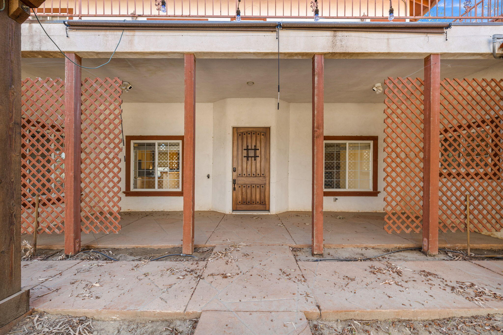 48755 Southview Place Indio, CA 92201 - Photo 20 of 55 front view of a house with a glass door