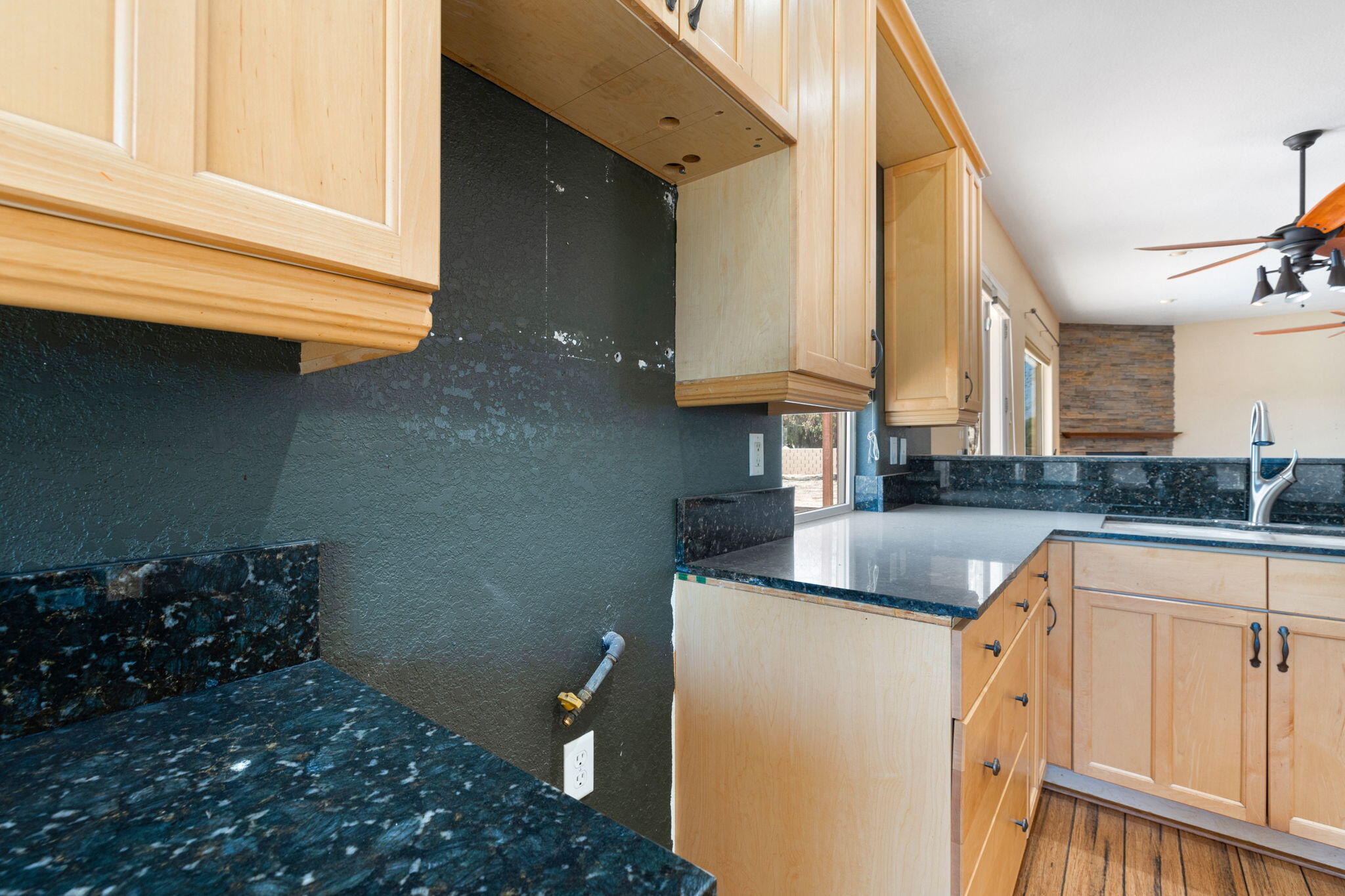 48755 Southview Place Indio, CA 92201 - Photo 27 of 55 a kitchen with sink cabinets and window