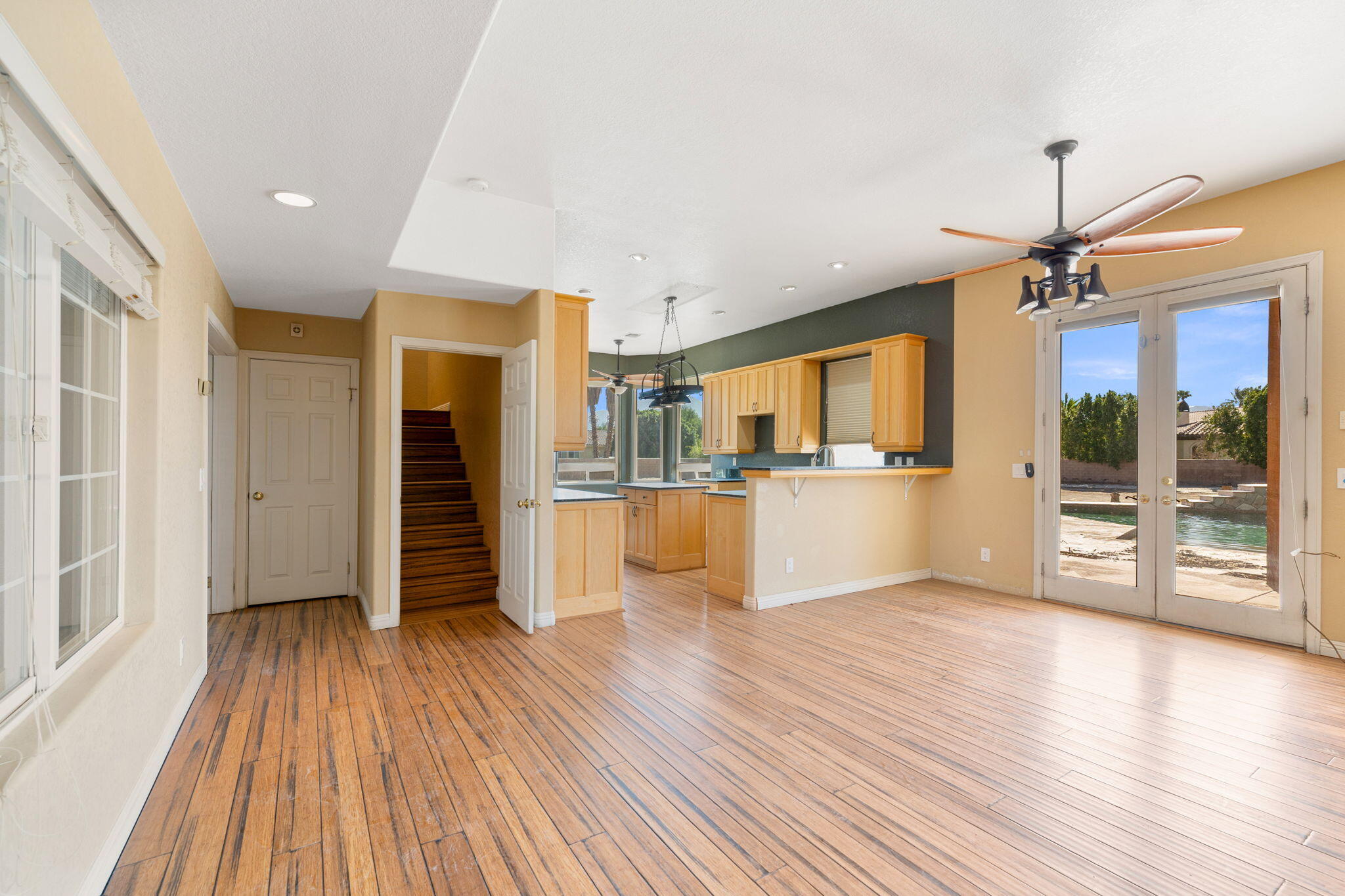 48755 Southview Place Indio, CA 92201 - Photo 31 of 55 a view of a kitchen with wooden floor and a kitchen