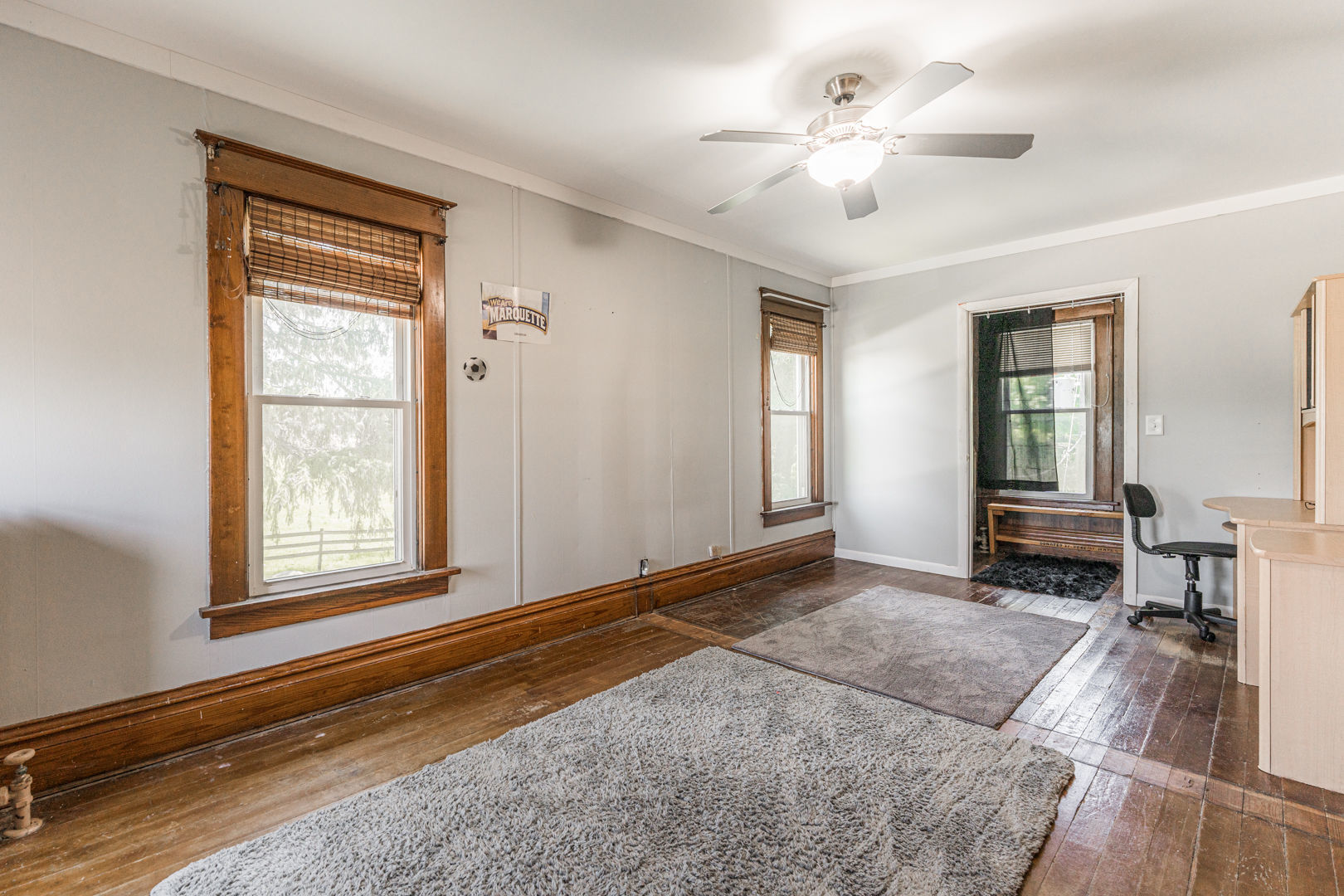12757 Base Line Road Genoa, IL 60135 - Photo 19 of 49 a living room with furniture and a window