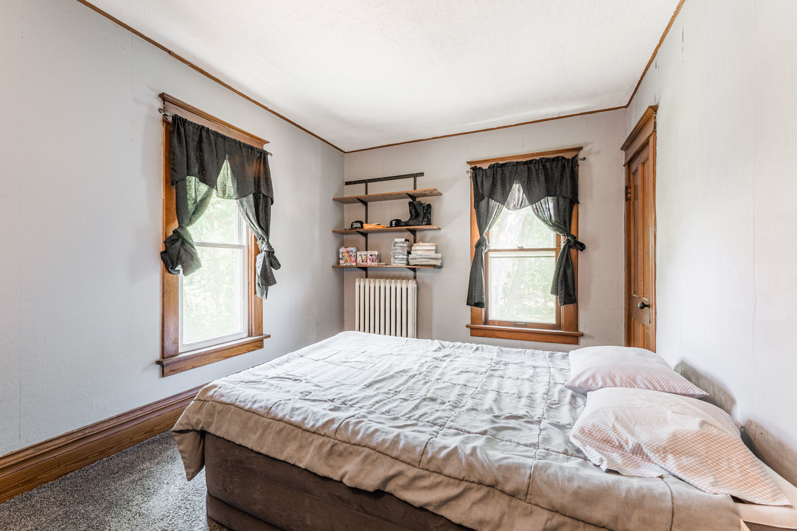 12757 Base Line Road Genoa, IL 60135 - Photo 20 of 49 a bedroom with a bed and a window