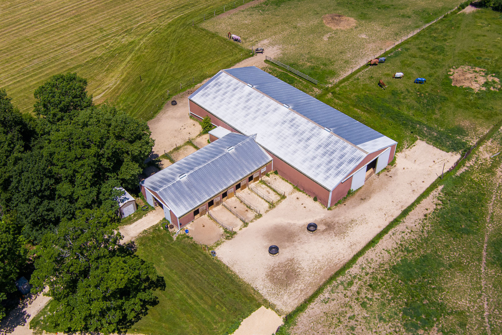 12757 Base Line Road Genoa, IL 60135 - Photo 25 of 49 an aerial view of a house with a garden and lake view