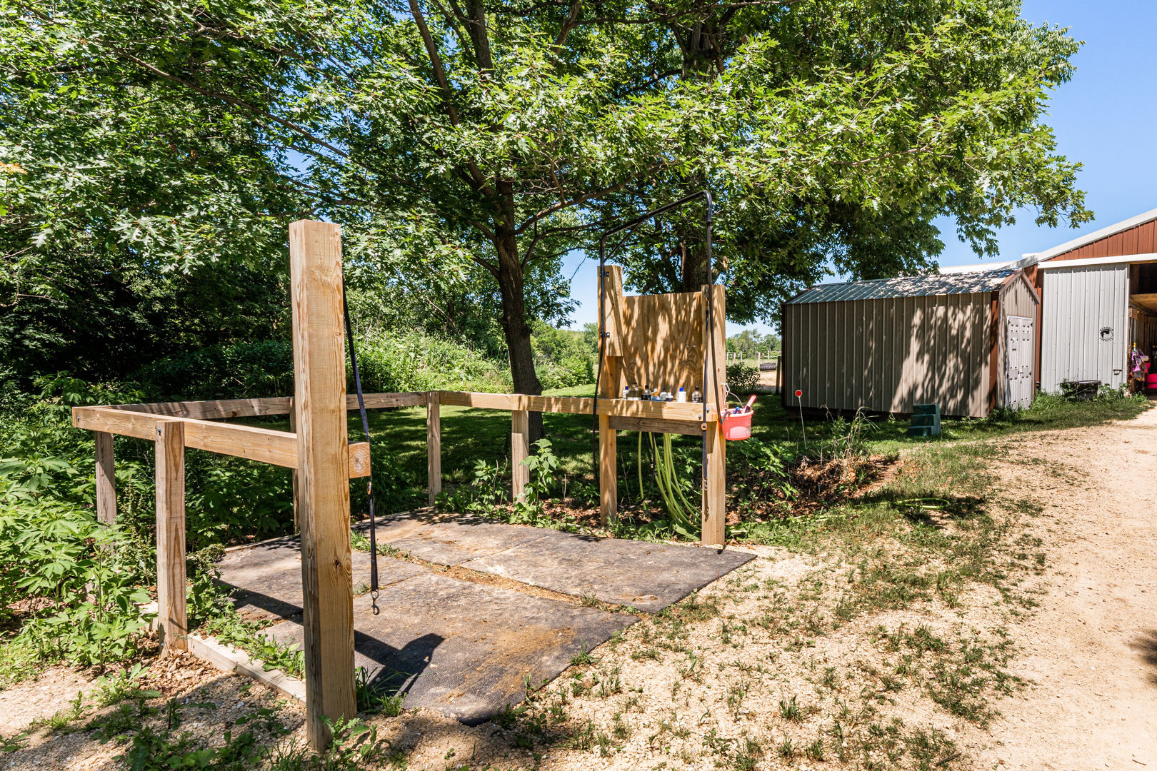12757 Base Line Road Genoa, IL 60135 - Photo 31 of 49 a view of a backyard with wooden fence and a bench
