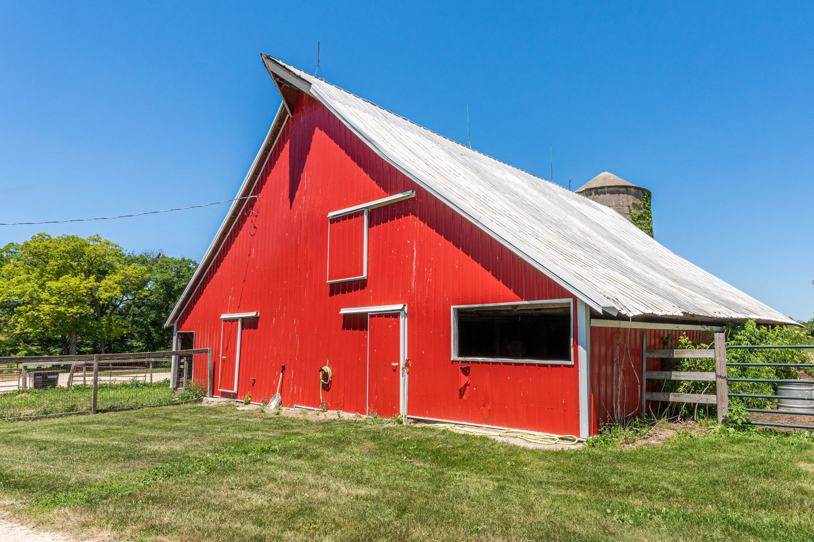 12757 Base Line Road Genoa, IL 60135 - Photo 38 of 49 a backyard of a house with table and chairs