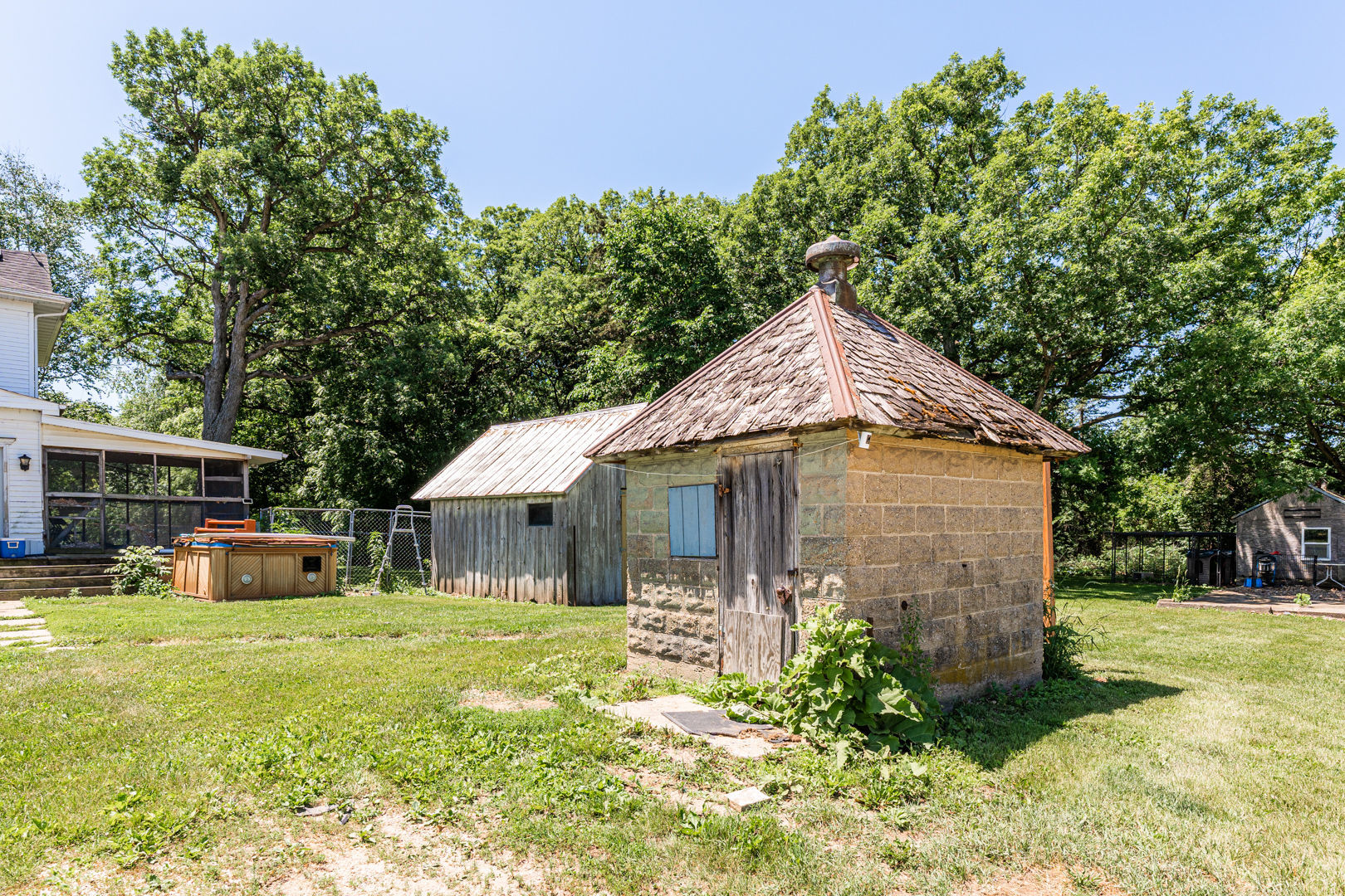 12757 Base Line Road Genoa, IL 60135 - Photo 45 of 49 a front view of a house with garden