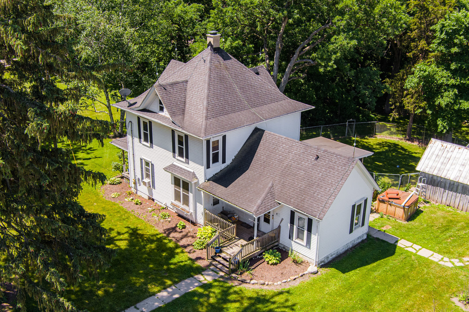 12757 Base Line Road Genoa, IL 60135 - Photo 7 of 49 an aerial view of a house with swimming pool and garden