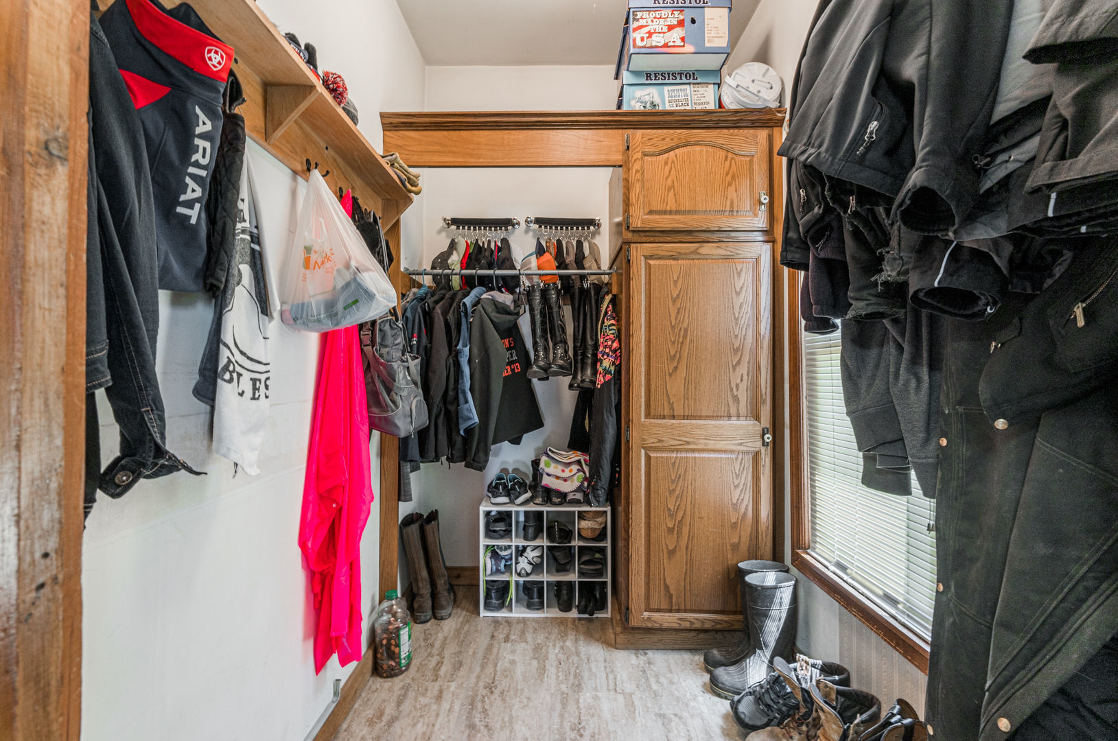 12757 Base Line Road Genoa, IL 60135 - Photo 10 of 49 a view of walk in closet with clothes and shoes