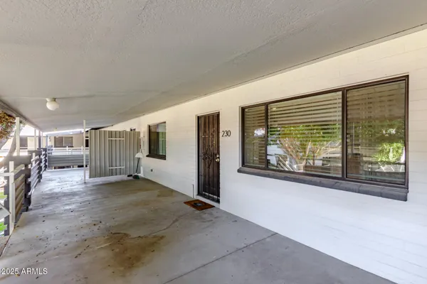 a view of livingroom with furniture and windows